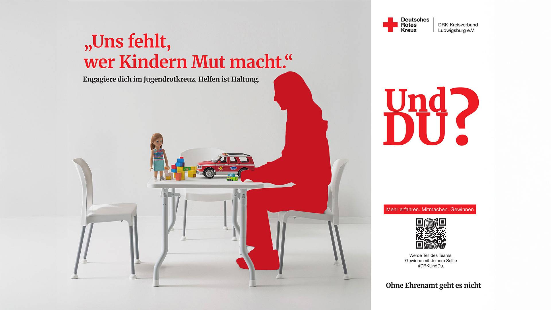 Rote Silhouette einer sitzenden Person an einem Tisch mit Spielzeug als symbolisches Motiv für Jugendarbeit.